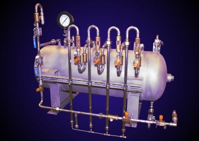 This is a horizontal pressure vessel that has been outfitted with stainless steel piping, valves and fittings.